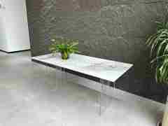 Newly Modern rectangular dining table with ceramic top and Acrylic legs