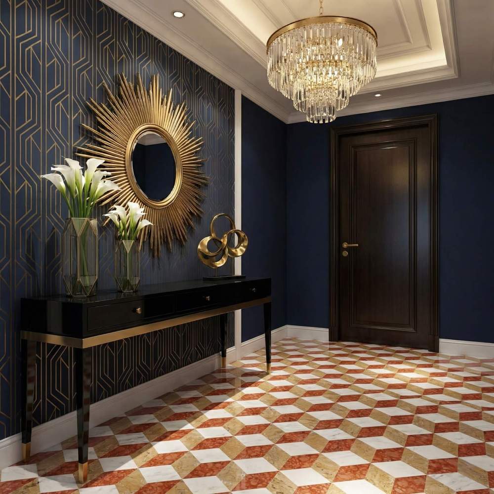 Luxury Art Deco foyer design featuring polished hexagon marble floor tiles in a 3D cube pattern, paired with dark blue wallpaper, gold sunburst mirror, and crystal chandelier.