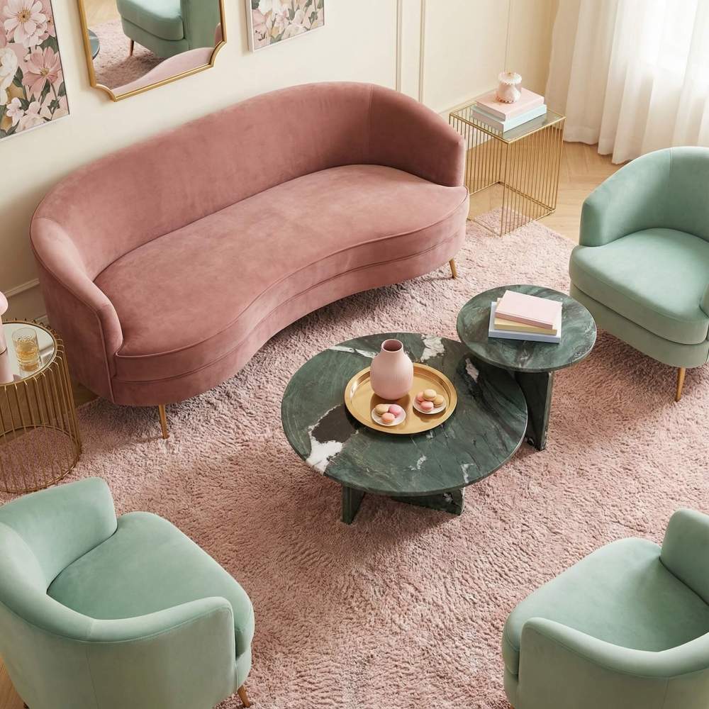 Eclectic pastel living room decor featuring the Diamond Green marble coffee table set paired with a curved pink velvet sofa for a bold, artistic contrast.