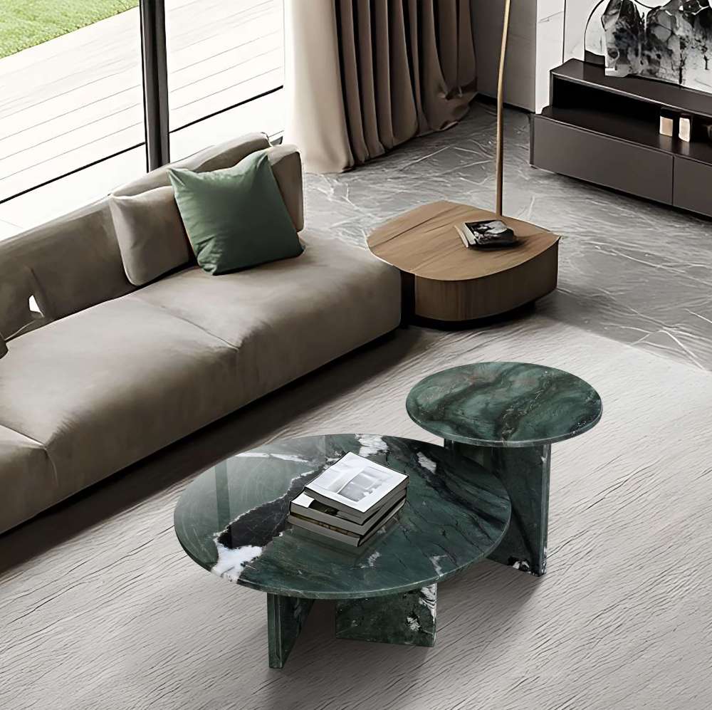 Top-down view of a modern living room design featuring the Diamond Green Natural Marble Nesting Table Set as a sophisticated centerpiece pairing with neutral tones.