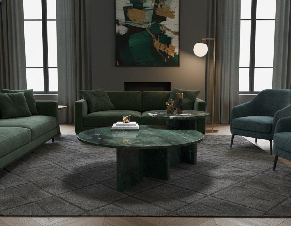 Monochromatic green living room decor idea: Emerald stone nesting tables paired with matching green sofas and rugs for a cohesive, nature-inspired luxury look.