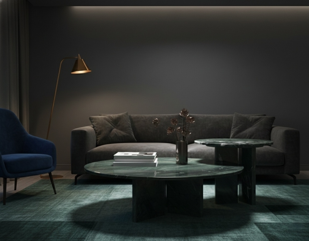 Moody interior design inspiration featuring the Diamond Green marble coffee table set in a dark living room setting, highlighting the stone's polished luster against velvet textures.