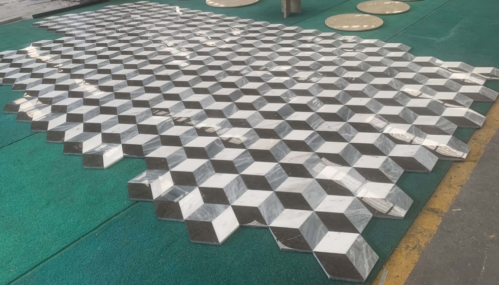 Large-scale layout demonstration of interlocking hexagon waterjet tiles, verifying the precision cut and perfect fit of the tumbling block design before packaging.