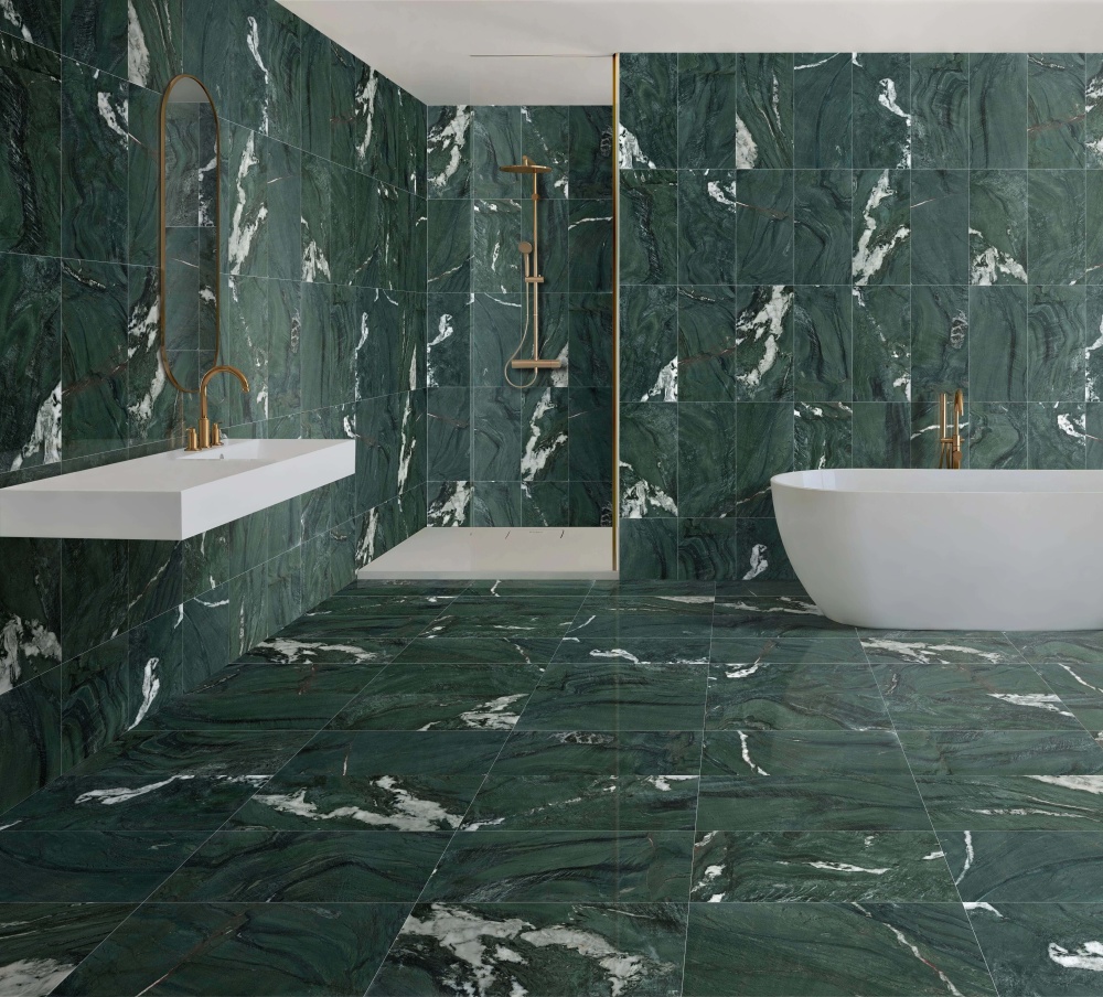 Opulent bathroom design using Diamond Green polished marble tiles, accented with brushed gold fixtures and a white freestanding bathtub for a high-end look.