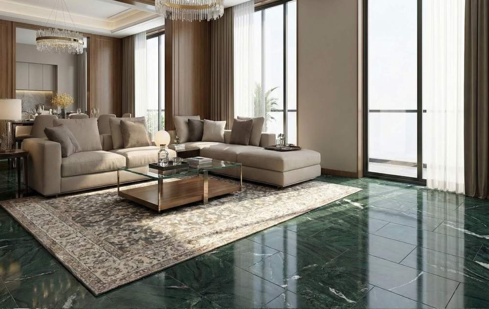 Spacious luxury living room featuring Diamond Green natural marble tile flooring, creating a sophisticated foundation for high-end residential interiors.