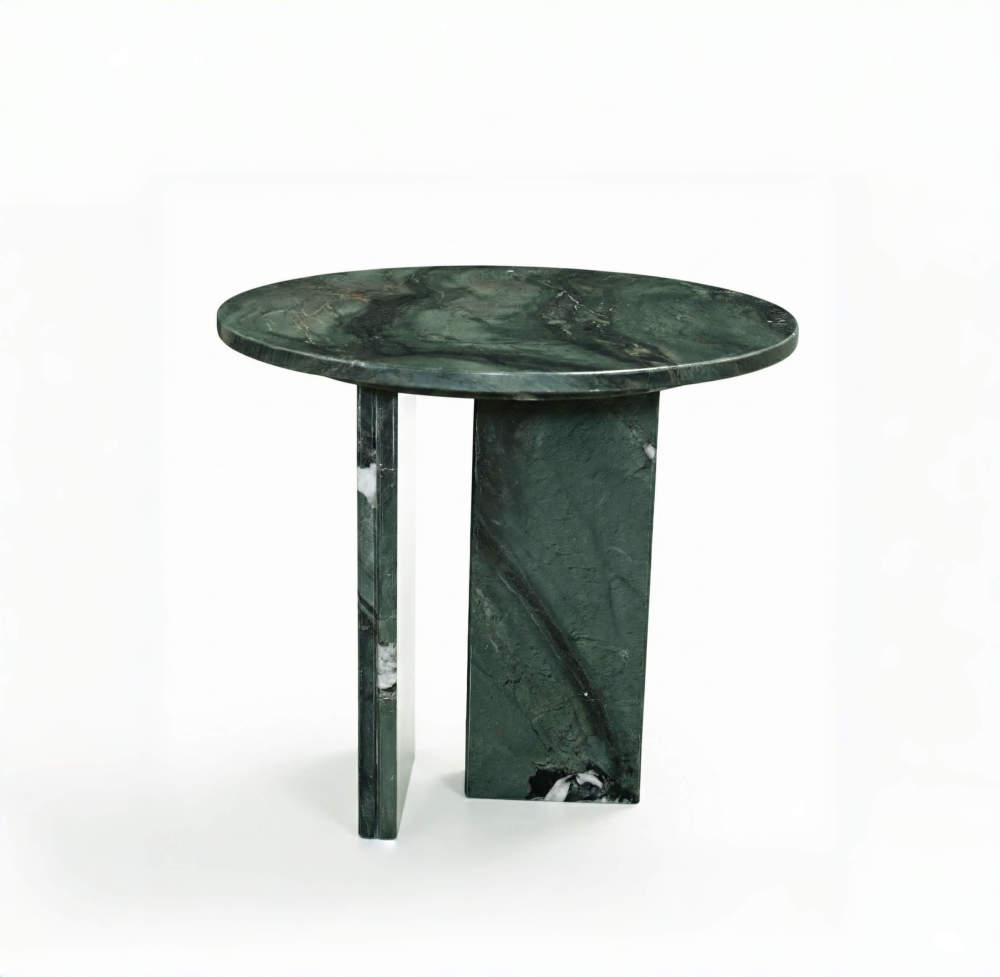 Close-up of the natural green marble tabletop surface displaying intricate white veining and high-gloss polished finish.