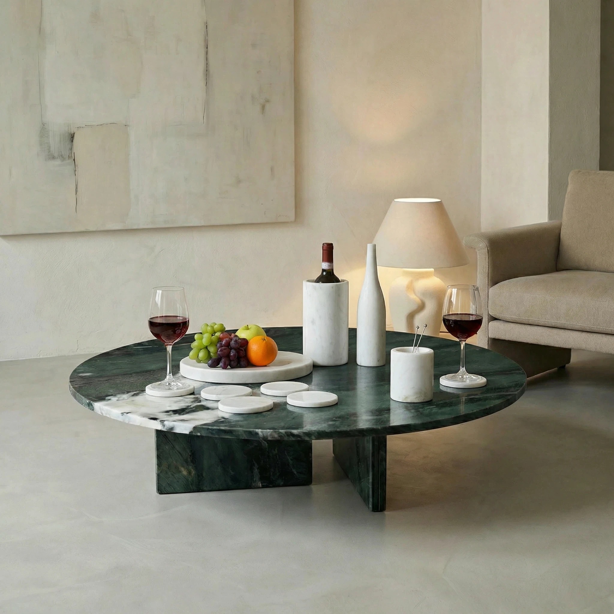 Diamond Green marble coffee table elegantly paired with the Snow Mountain White Marble dining set, creating a cohesive natural stone look.