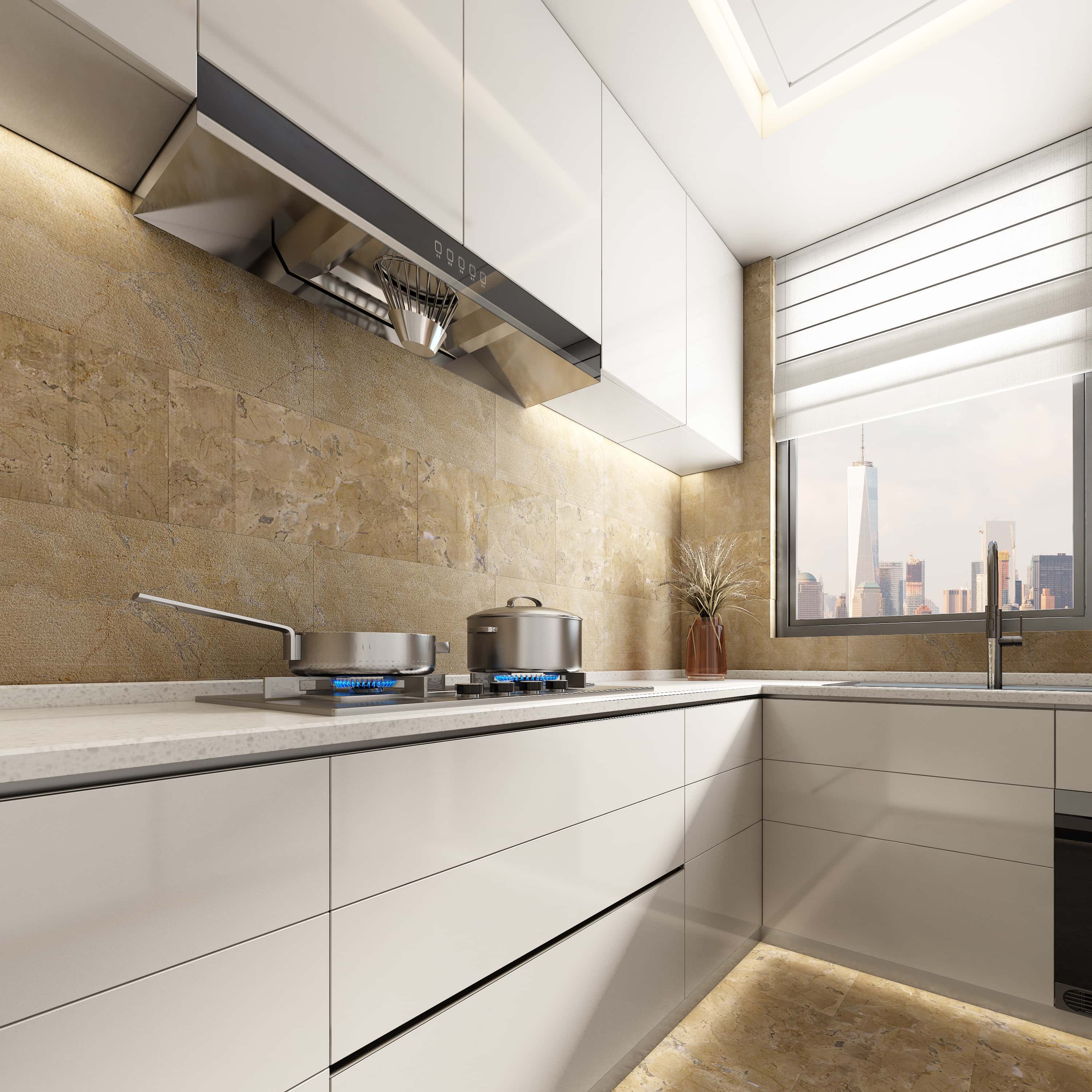 Modern white kitchen featuring a stunning backsplash design using mixed finishes of 12x24 Hyatt Gold natural marble. The combination of polished and FS surfaces highlights the 100% unique natural stone textures.