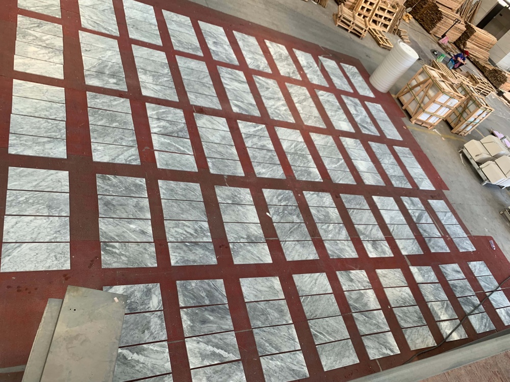 12x24 Carrara Gray marble tiles prepared in the factory for secure damage-proof packaging, ready to be shipped to our US warehouse.