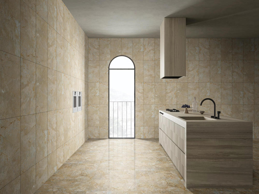 Luxury kitchen design utilizing 12x24 Hyatt Gold marble, combining polished flooring with an FS finish wall for a sophisticated, exclusive natural stone look.
