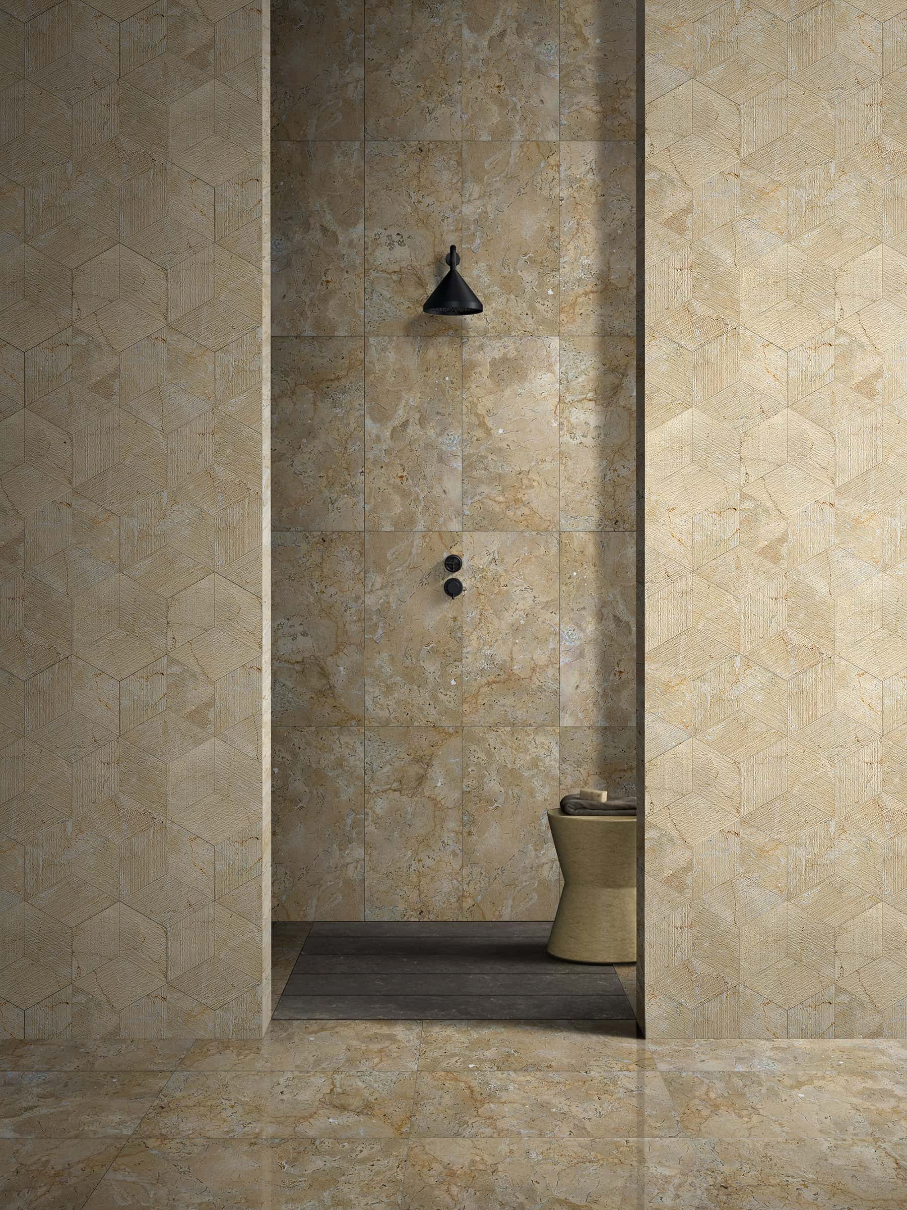 A luxurious modern shower showcasing a stunning mix of 100% natural Hyatt Gold marble: 12x24 polished tiles on the floor and center wall, perfectly complemented by exclusive 3D textured hexagon tiles on the side walls. Every natural piece is completely unique.