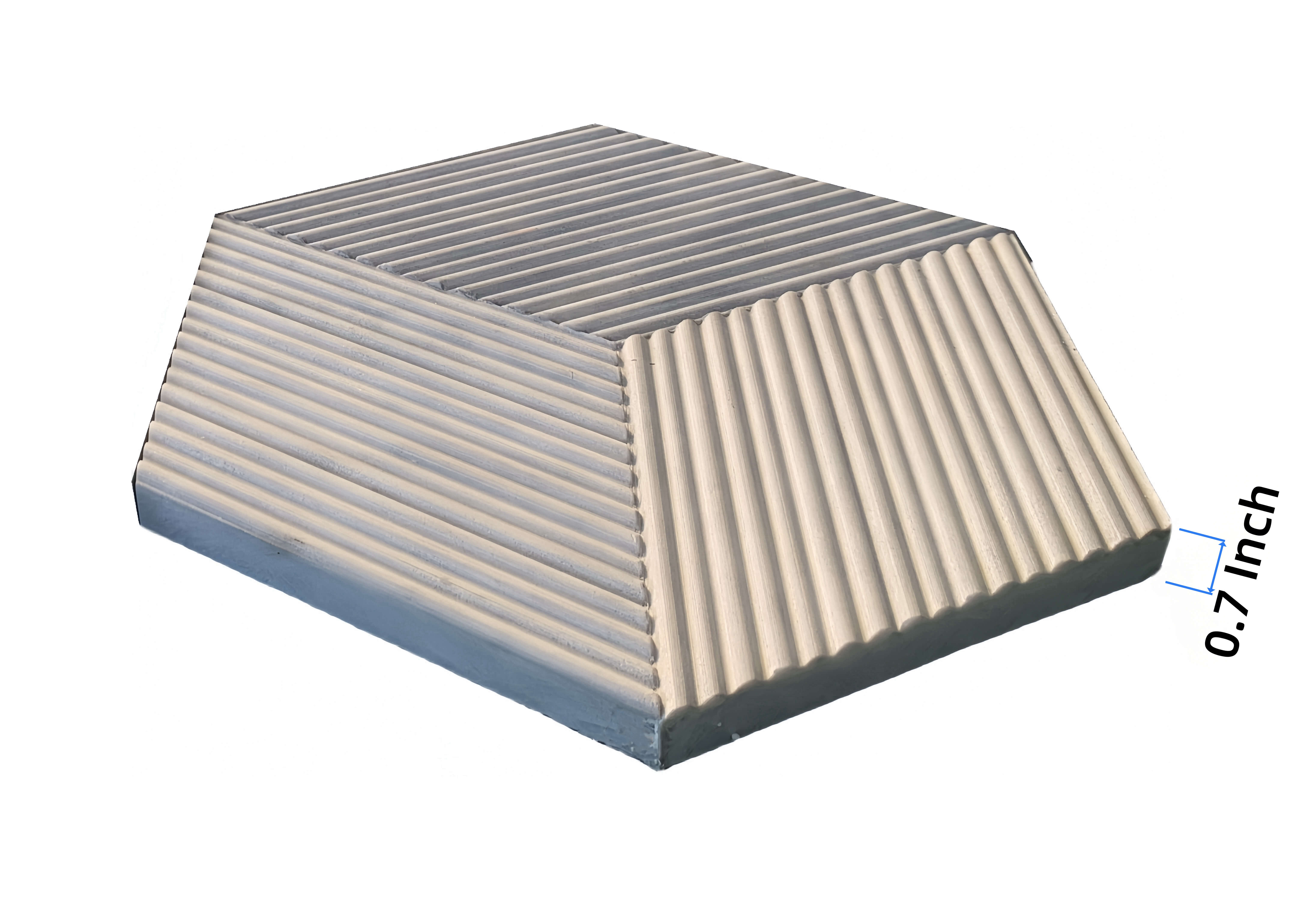 Side view of the textured Carrara Gray hexagon marble tile displaying a solid 0.7-inch thickness for durability.
