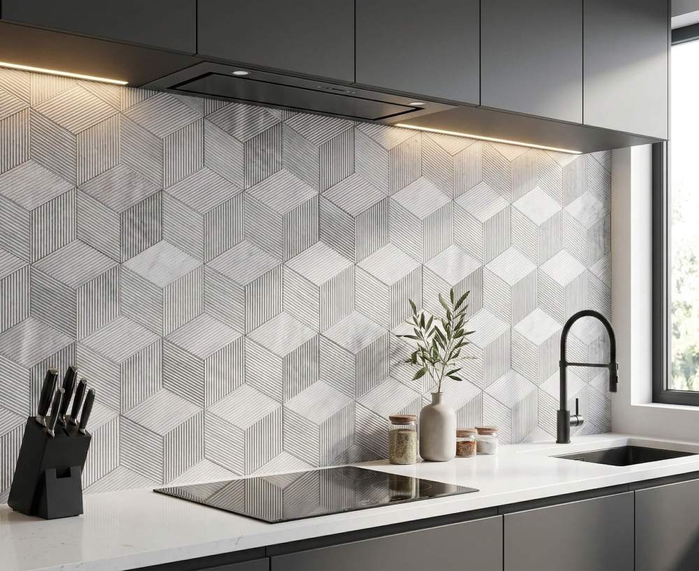 Modern kitchen backsplash featuring durable Carrara Gray OL textured finish marble tiles, perfectly blending geometric 3D art with natural stone.