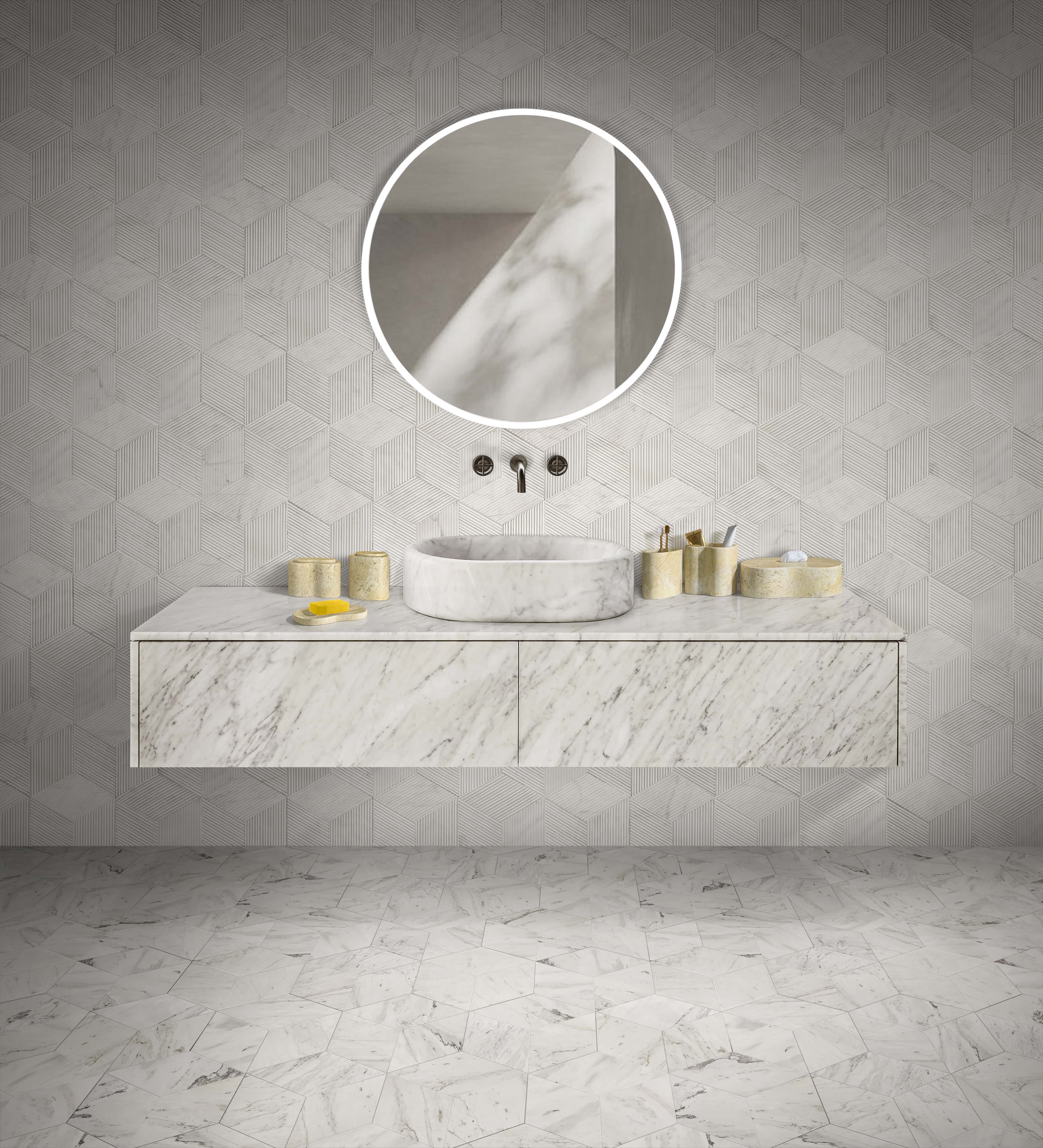 Luxury bathroom styling featuring polished Snow Mountain White hexagon marble floor tiles, textured wall tiles, a matte oval sink, and an elegant wavy 6-piece accessory set.