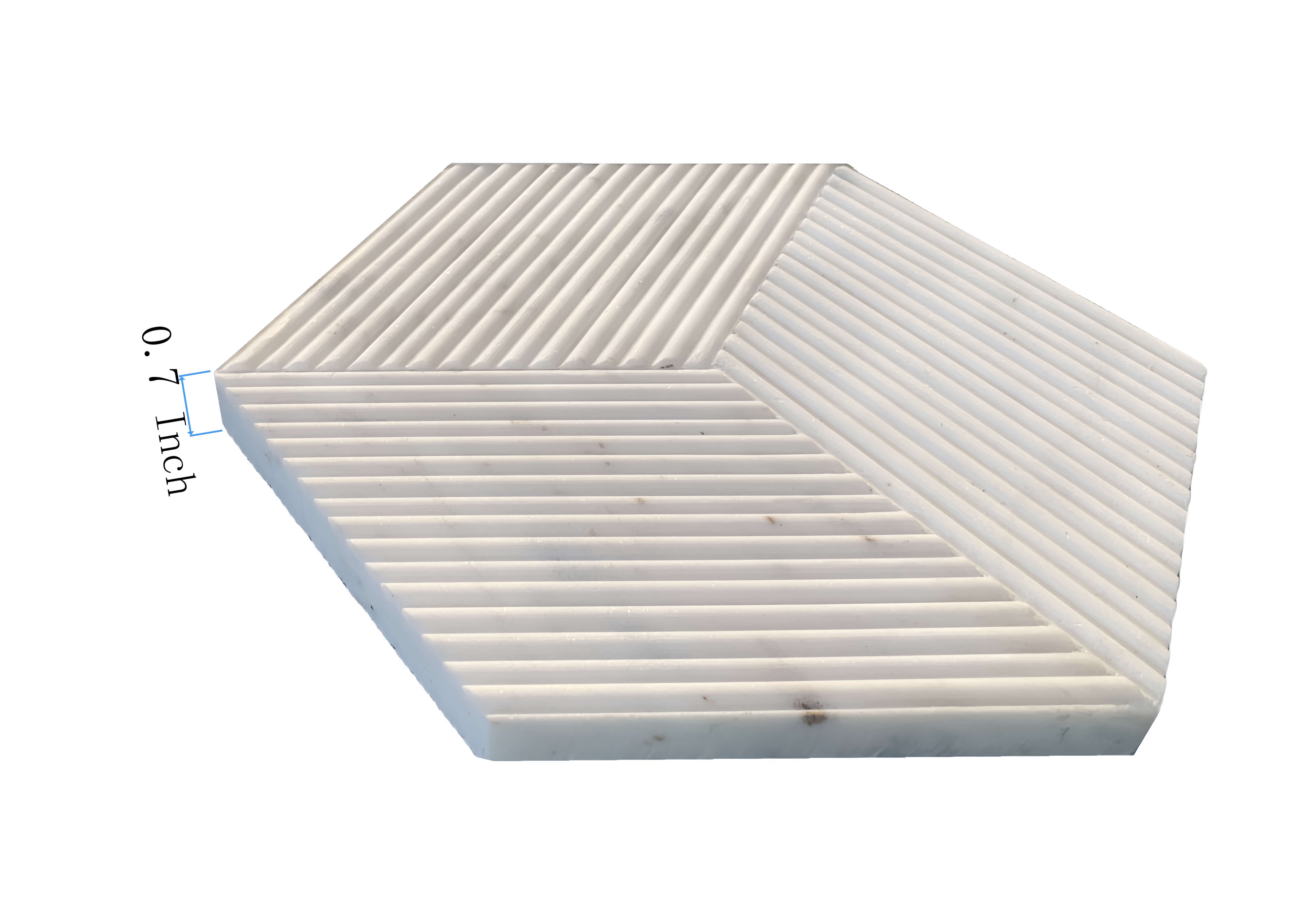 Side view showing the 0.7-inch thickness of the textured Snow Mountain White hexagon marble tile, highlighting its solid natural stone quality.