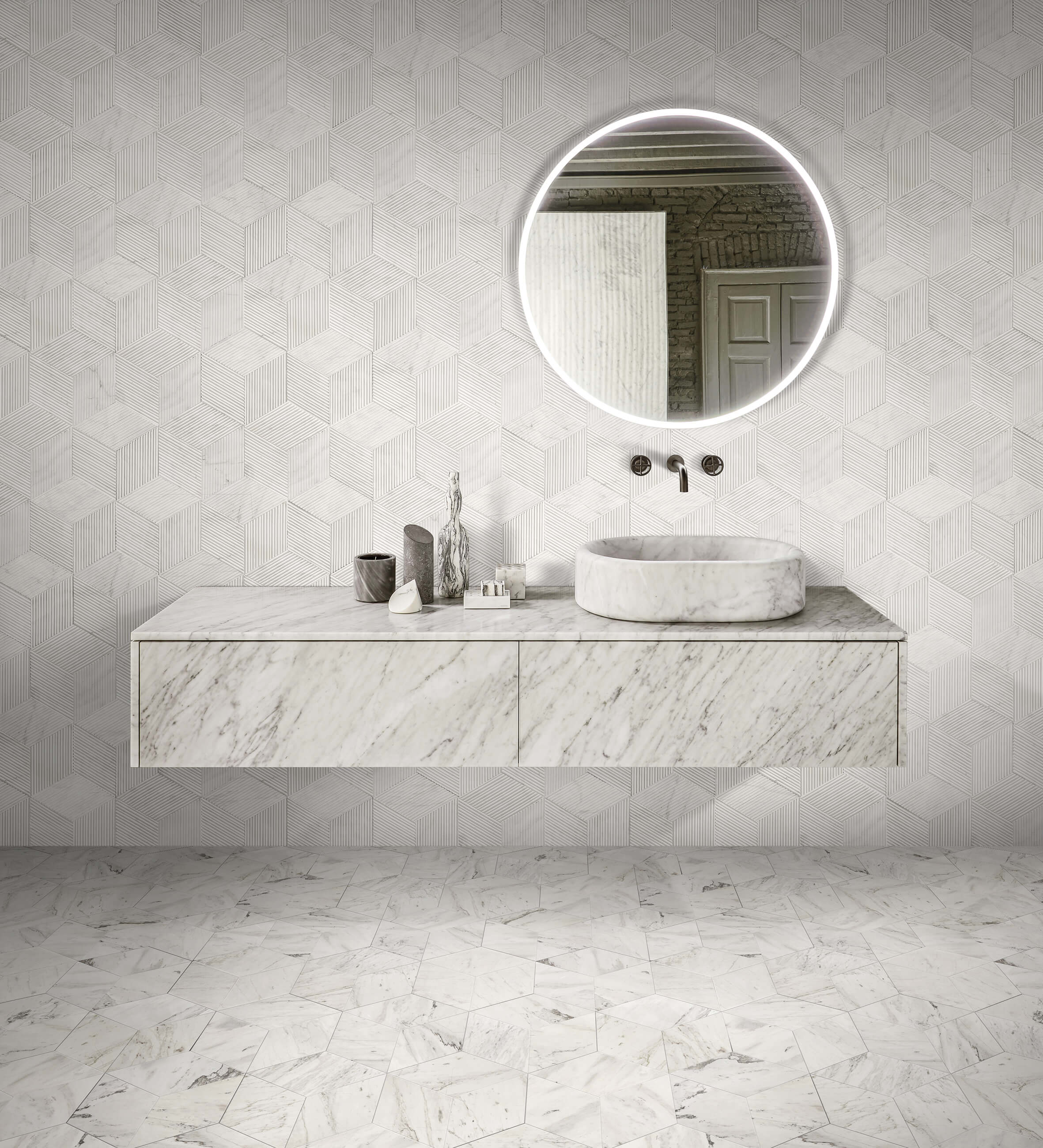 Elegant bathroom vanity showcasing a unique combination of Snow Mountain White marble: polished hexagon tiles on the floor and our exclusive OL textured fluted tiles on the wall.