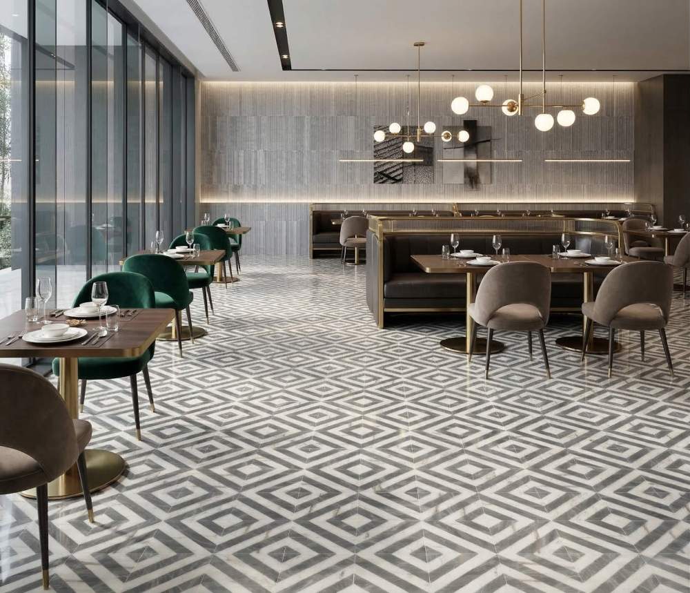 Upscale commercial restaurant space utilizing durable and visually stunning white and gray waterjet marble tiles for the dining floor.