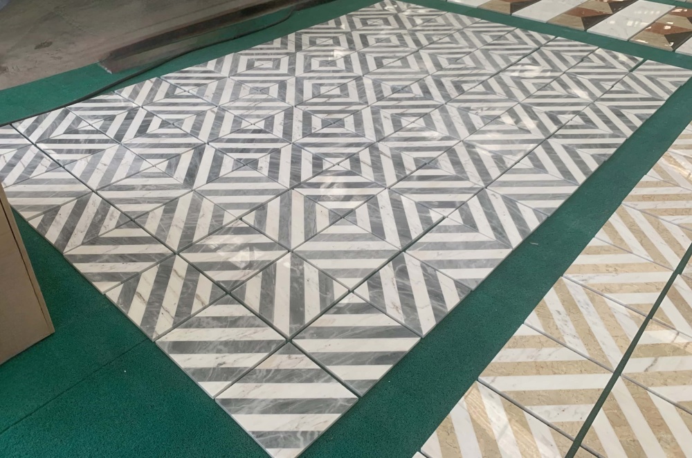 Large-scale floor layout demonstrating the unique natural veining, ensuring every natural marble piece is one of a kind.