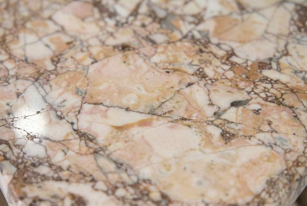 Extreme close-up of the 100% natural diamond pink marble texture, featuring distinctive and luxurious Rose Tea veins.