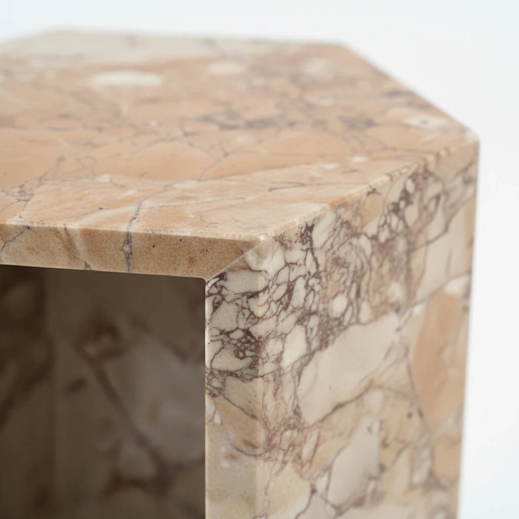 Close-up of the beautifully polished edges on the solid marble accent table, displaying the premium thickness and unique quality of the natural stone.