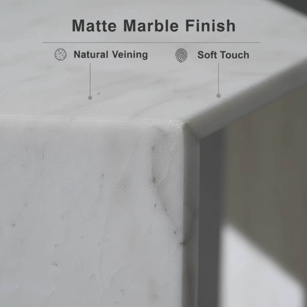 Close-up of the honed matte marble finish, highlighting the natural veining and soft touch of the 100% genuine Snow Mountain white stone.