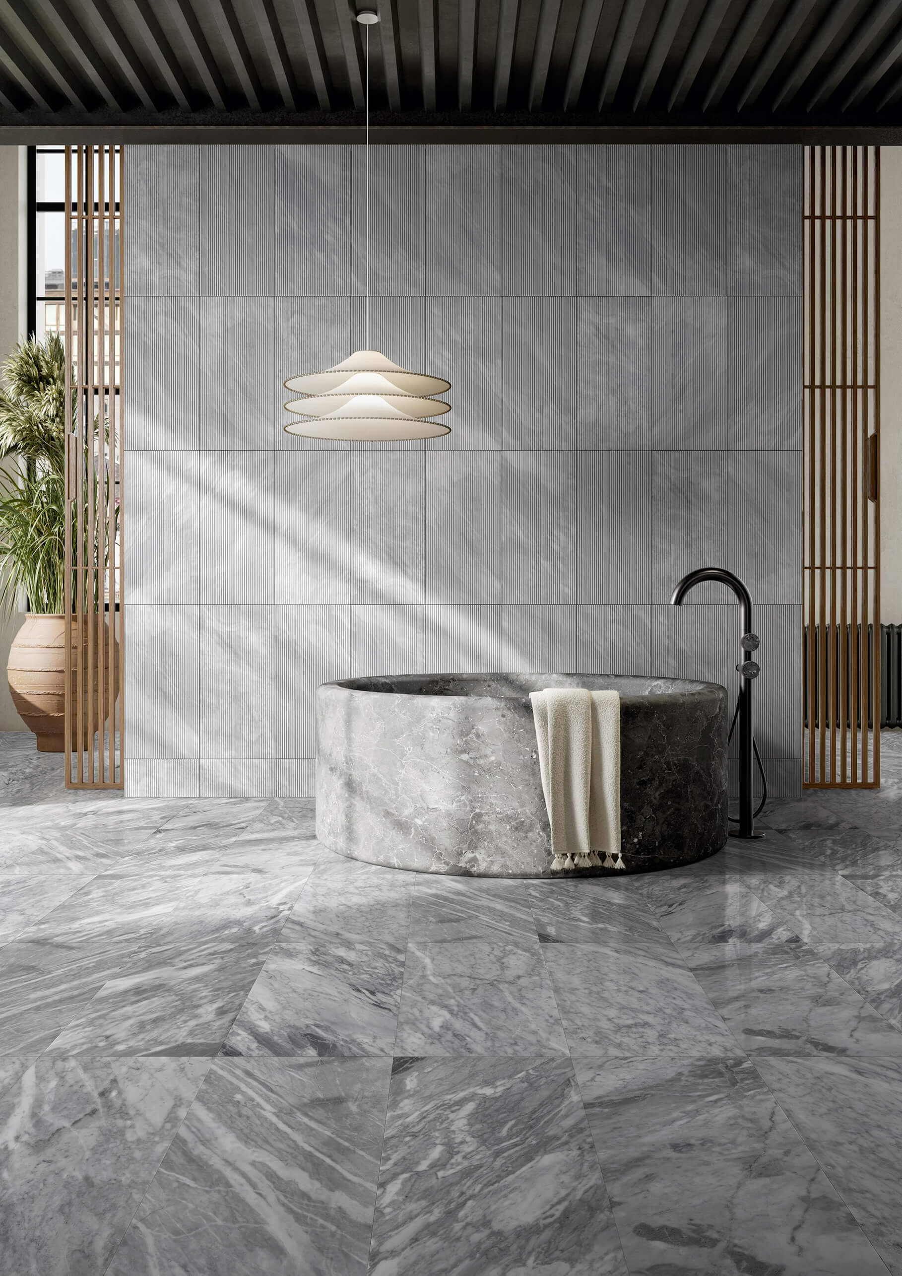 Modern bathroom blending 12x24 Carrara Gray polished marble floors with striking OL textured finished walls. This unique natural stone combo is in stock at our US warehouse.