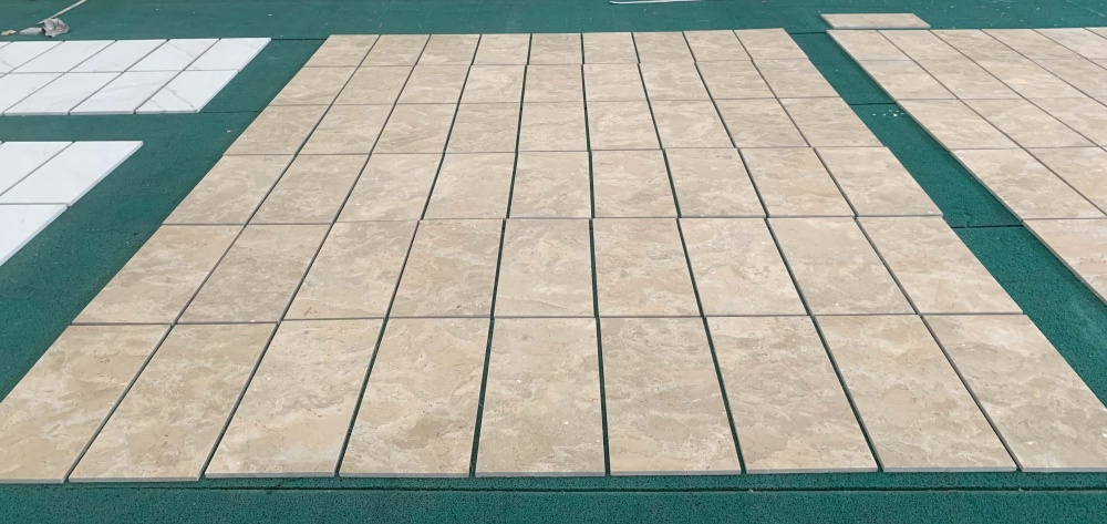 Factory layout of multiple Hyatt Gold marble tiles, proving that every piece of natural marble is unique in its aesthetic appeal.