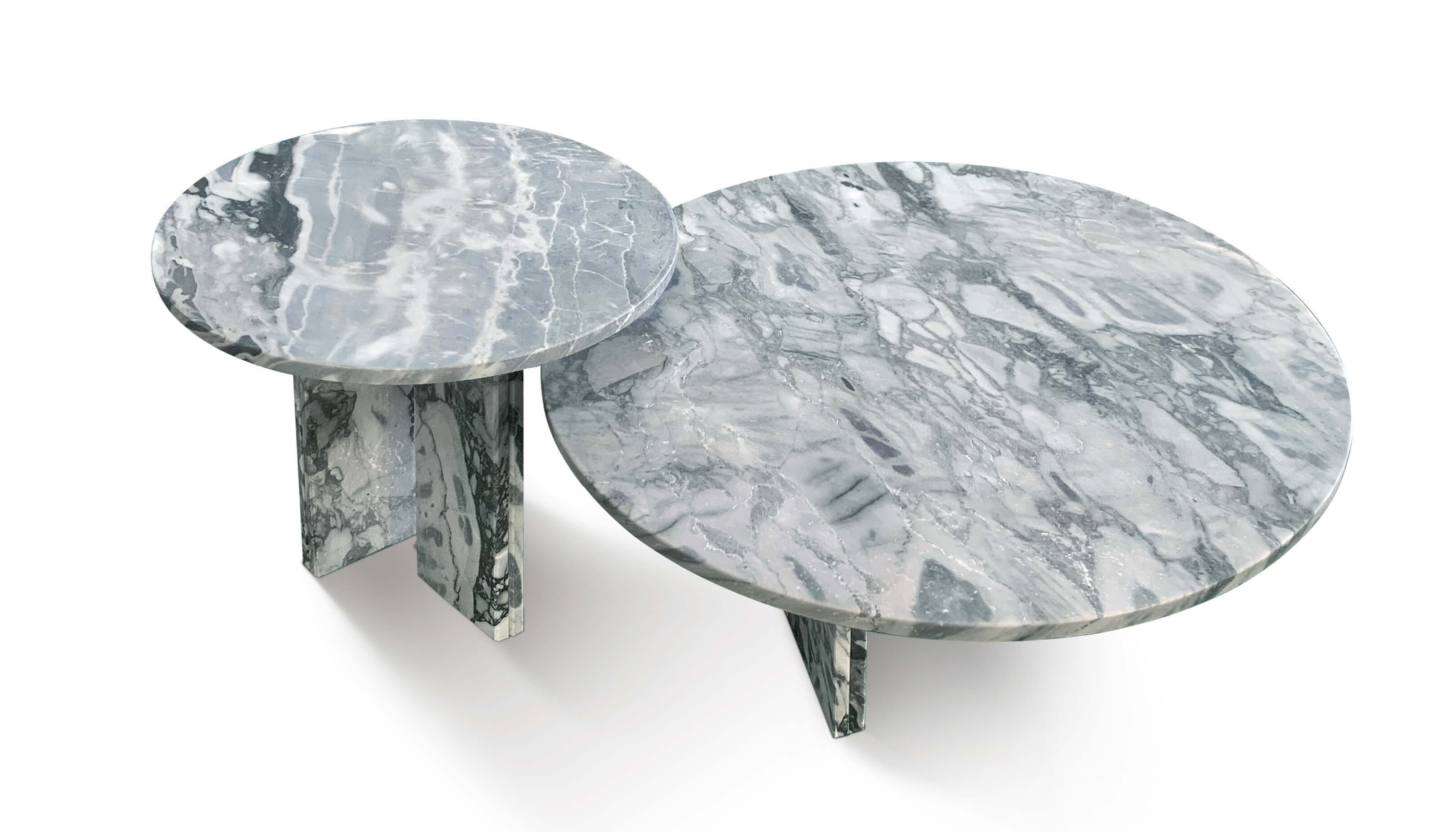 Top view of the polished Cloudy Blue marble coffee tables, showcasing the exclusive and uniquely fluid patterns of the circular natural stone tabletops.