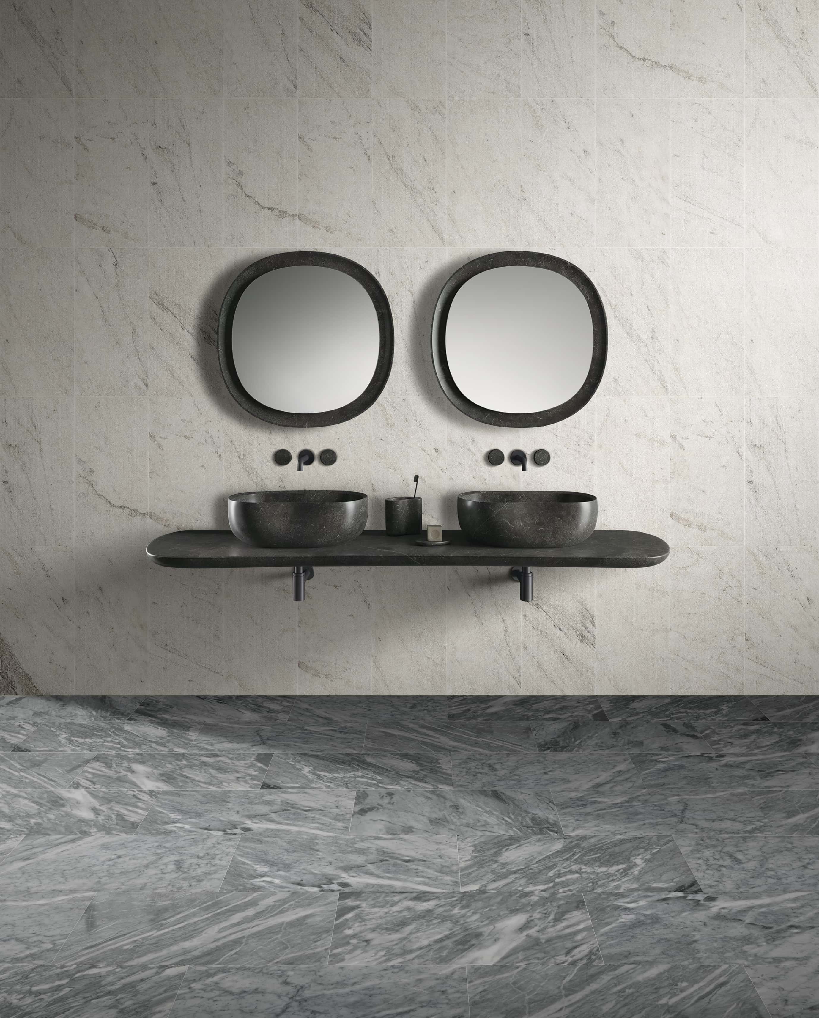 Modern bathroom vanity design mixing 12x24 Snow Mountain White textured marble wall tiles with Carrara Gray polished marble floor tiles for a stunning luxury contrast.