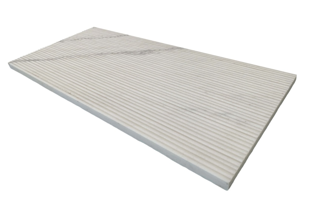 Side angle of Snow Mountain White marble tile highlighting the architectural 3D ribbed surface.