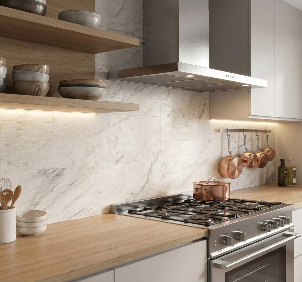Luxury kitchen design featuring Snow Mountain White natural stone cladding as a durable, premium, and stunning stove backsplash.