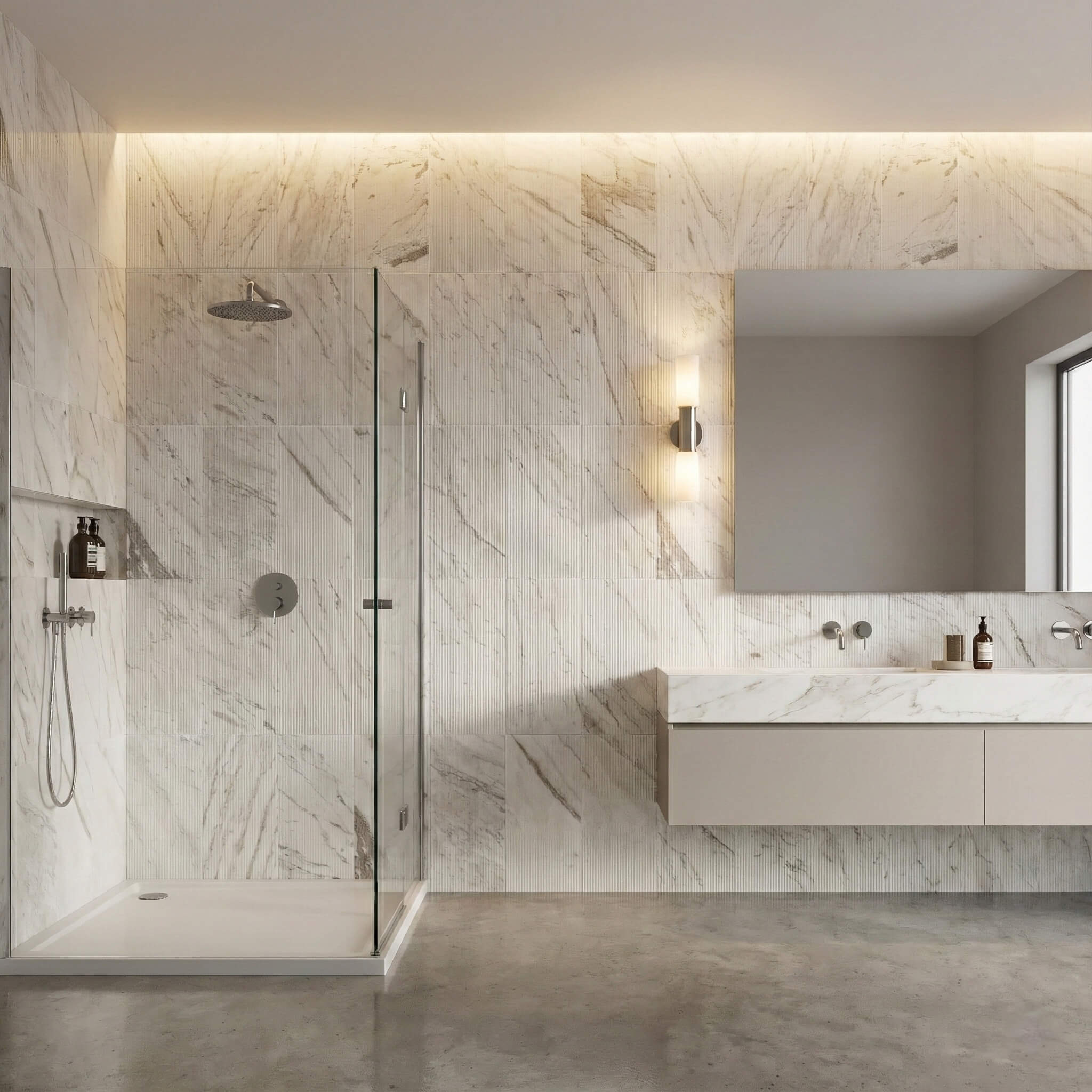 Contemporary bathroom vanity and shower space elevated by the sophisticated architectural lines of Snow Mountain White fluted marble tiles.
