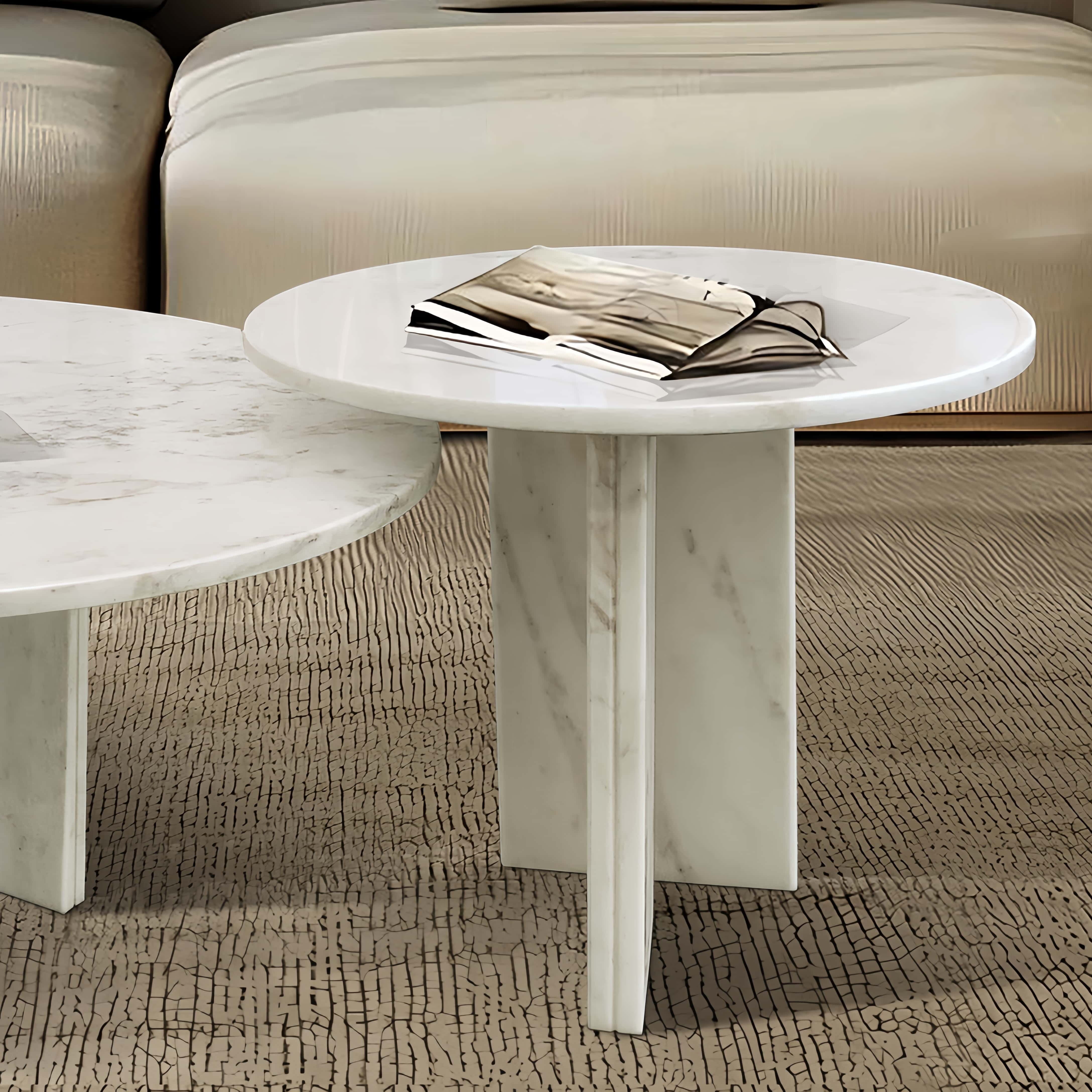 Detail shot of the sturdy geometric marble base and the seamless nesting design of the 2-piece coffee table set.