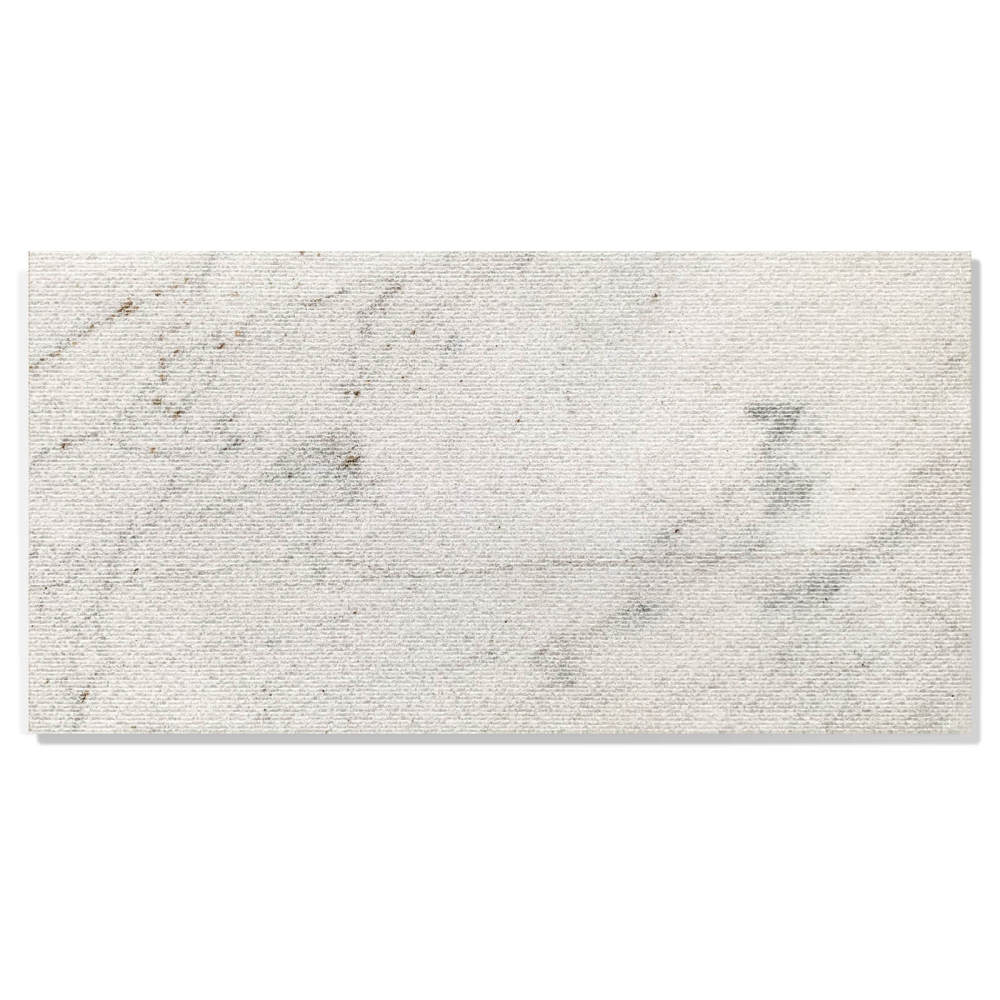 Front view of a 12x24 Snow Mountain White textured marble wall tile featuring a unique linear grooved finish for luxury interiors.