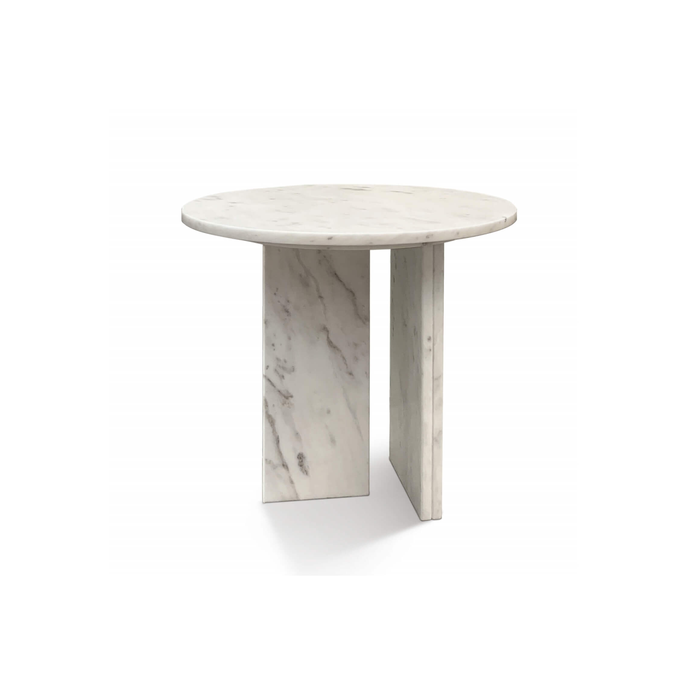 Angle view of a luxury round snow mountain white marble coffee table with unique natural veining, a perfect minimalist centerpiece.