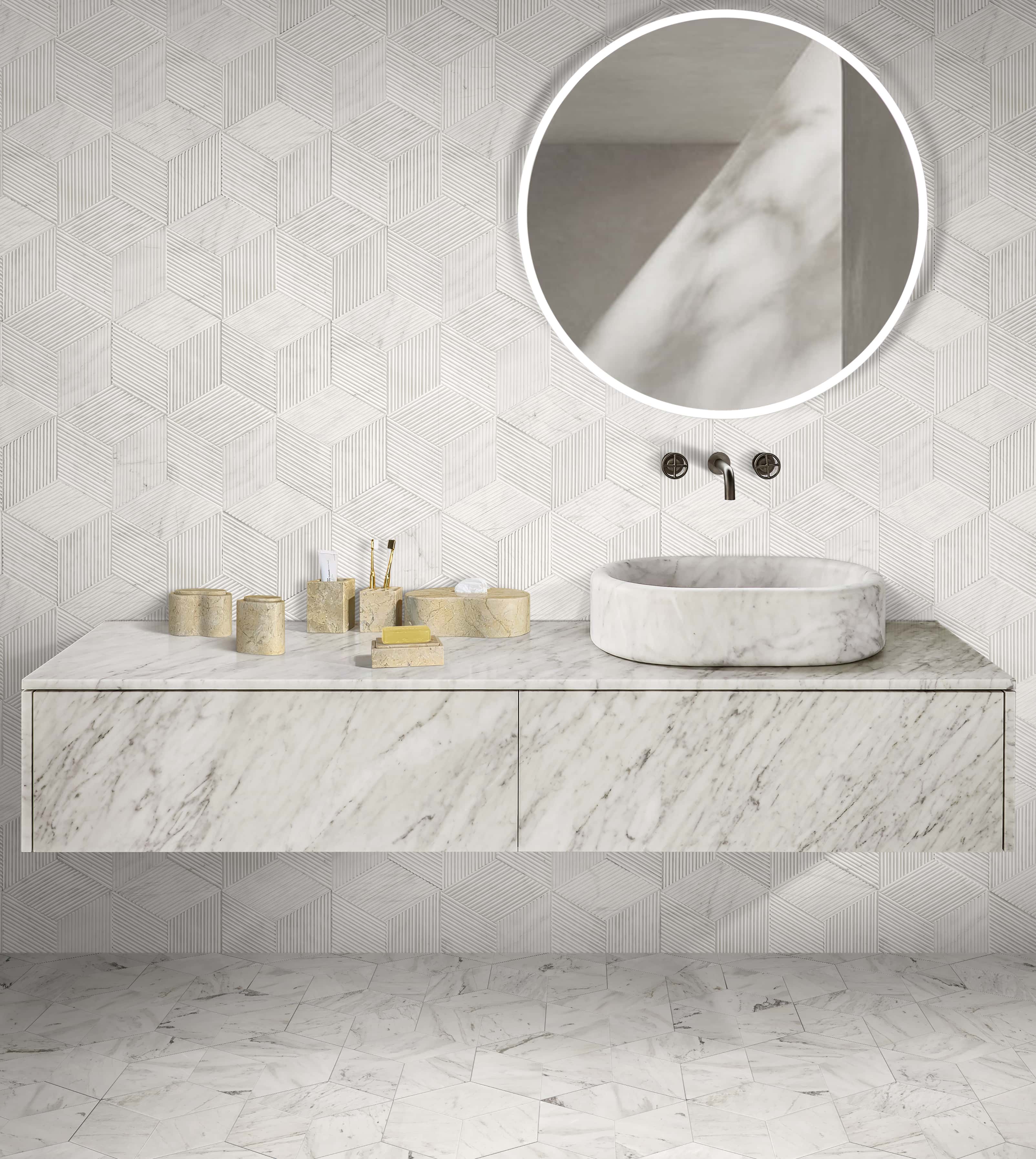 Luxury bathroom design featuring the Hyatt Gold 6-piece marble set paired with a Snow Mountain White honed vessel sink on the right. Accented by white hexagon polished floor tiles and textured wall tiles.