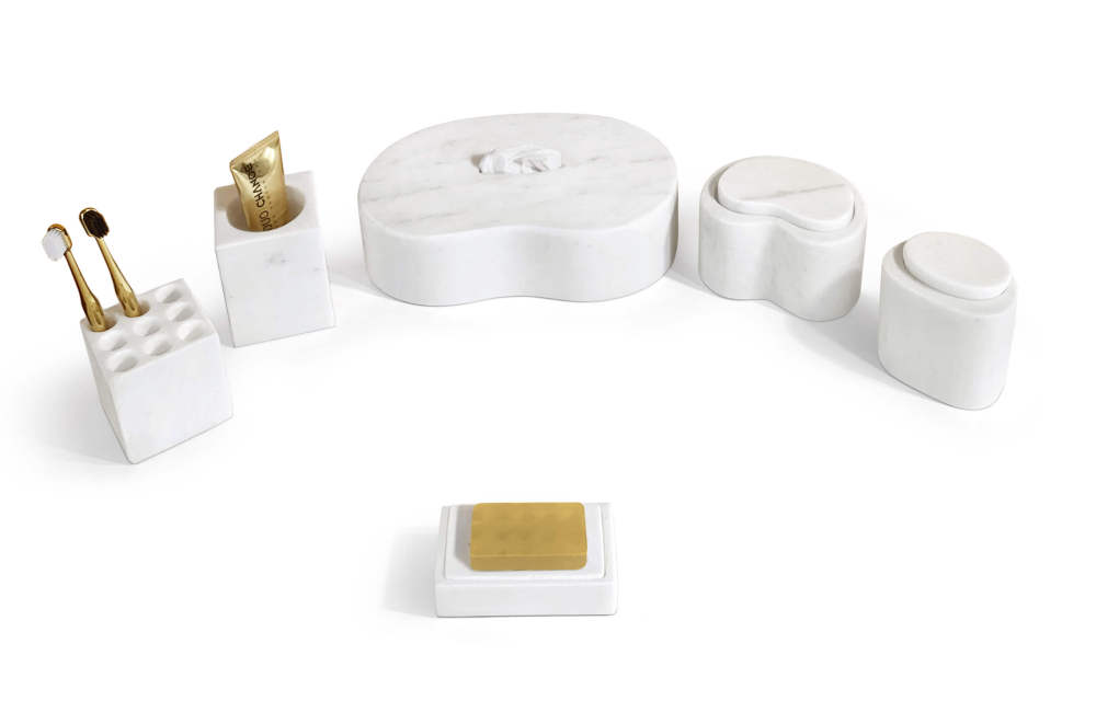 Top-angled view of the elegant Snow Mountain White marble bathroom countertop accessories set in use, highlighting its functionality and premium aesthetic.