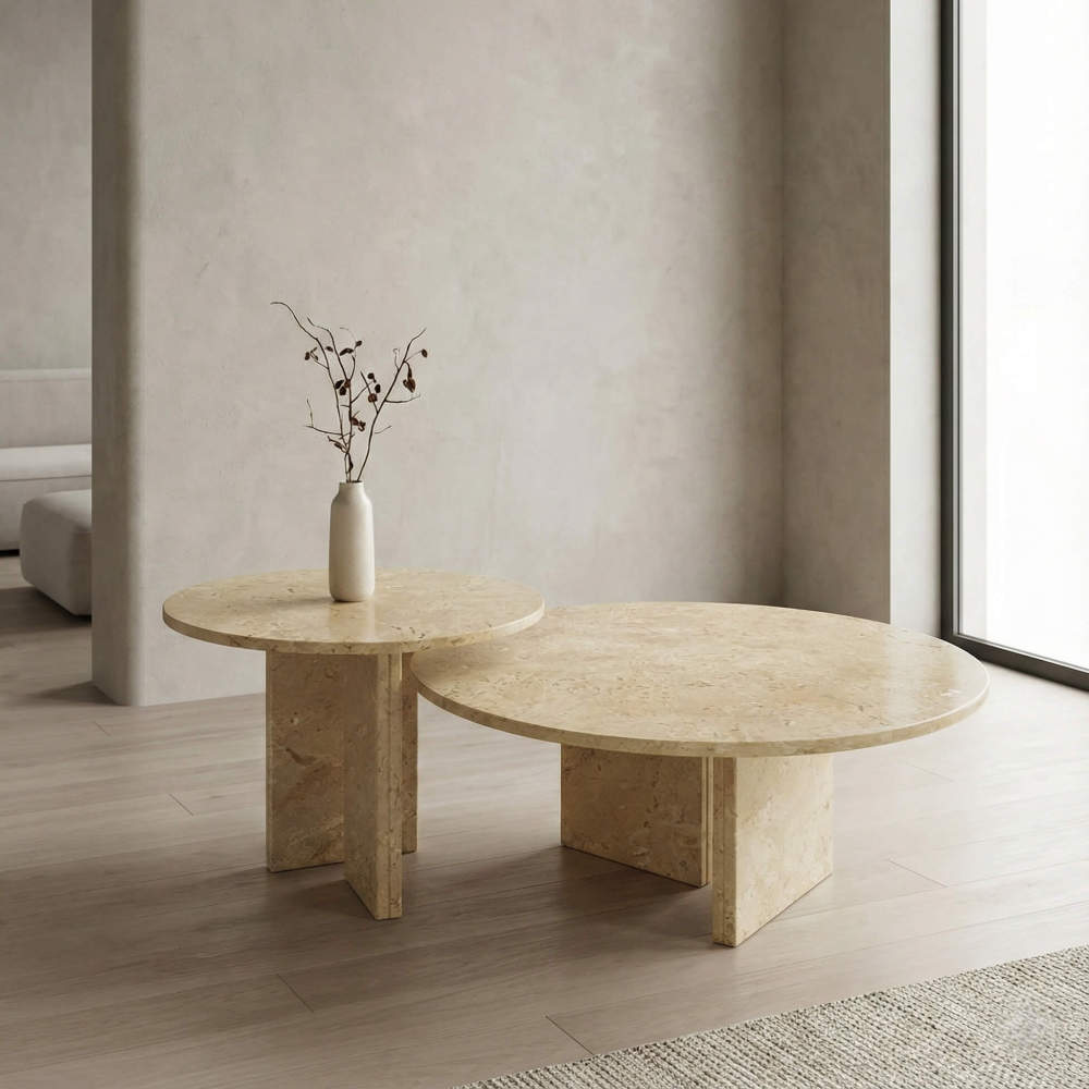 Minimalist wabi-sabi interior featuring the Hyatt natural marble nesting coffee table set. The 100% exclusive gold-beige stone creates a serene, unique centerpiece for modern homes.