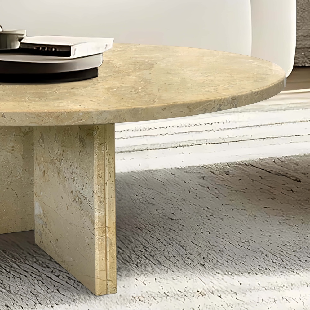 Detailed view of the sturdy geometric cross-base design of the marble nesting coffee table, emphasizing the solid 100% natural stone construction and premium structural stability.