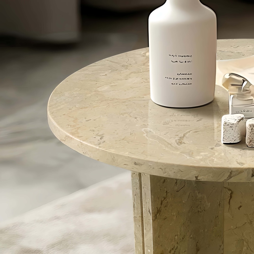 Close-up of the polished tabletop on the Hyatt Gold marble coffee table. Displays the distinct, 100% natural gold yellow veining making each piece truly unique.