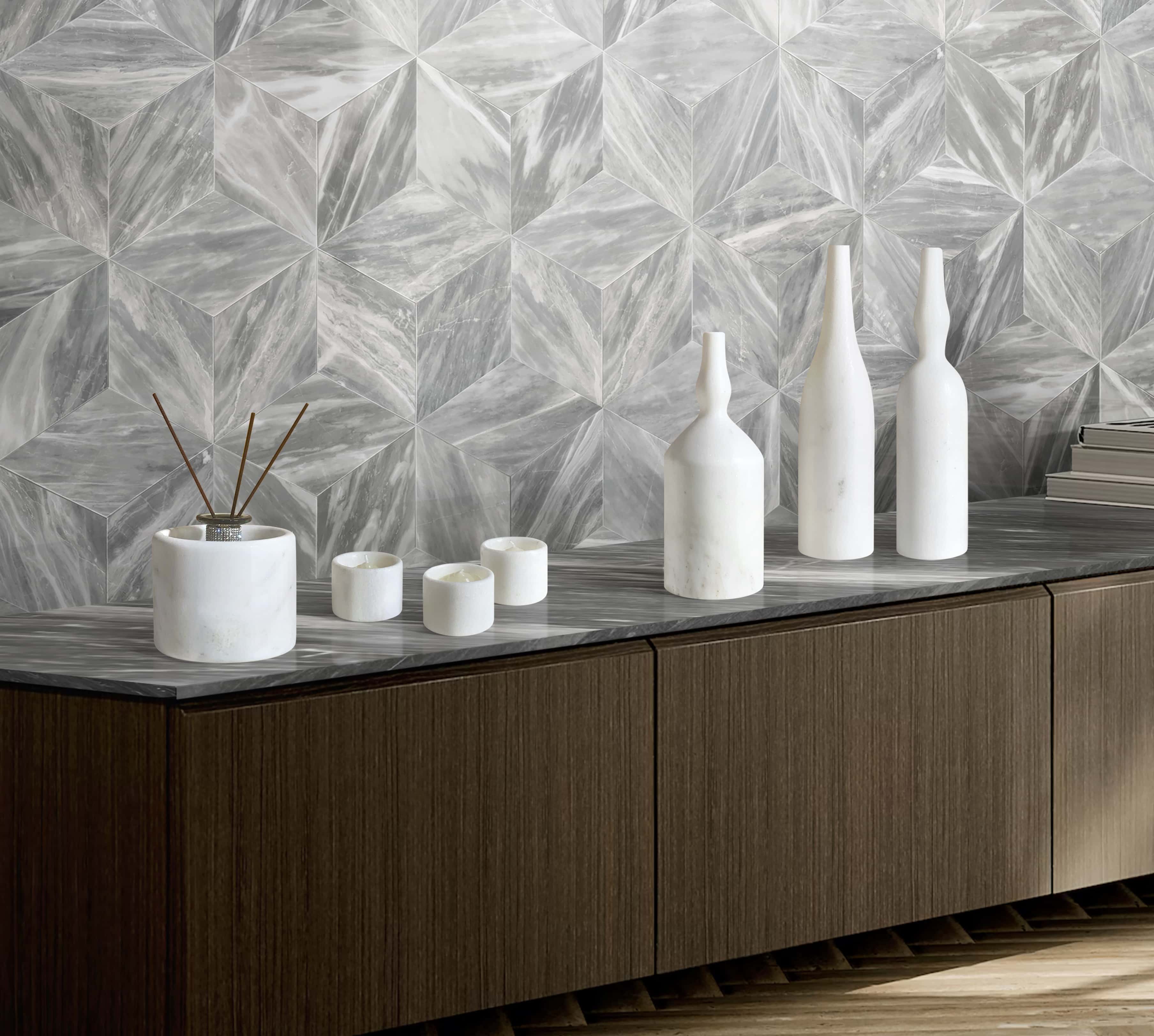 Close-up view of the genuine Snow Mountain White marble decor set paired with a Carrara Gray Hexagon honed finished tile wall. Every natural marble piece is unique. US warehouse in stock for immediate shipping.