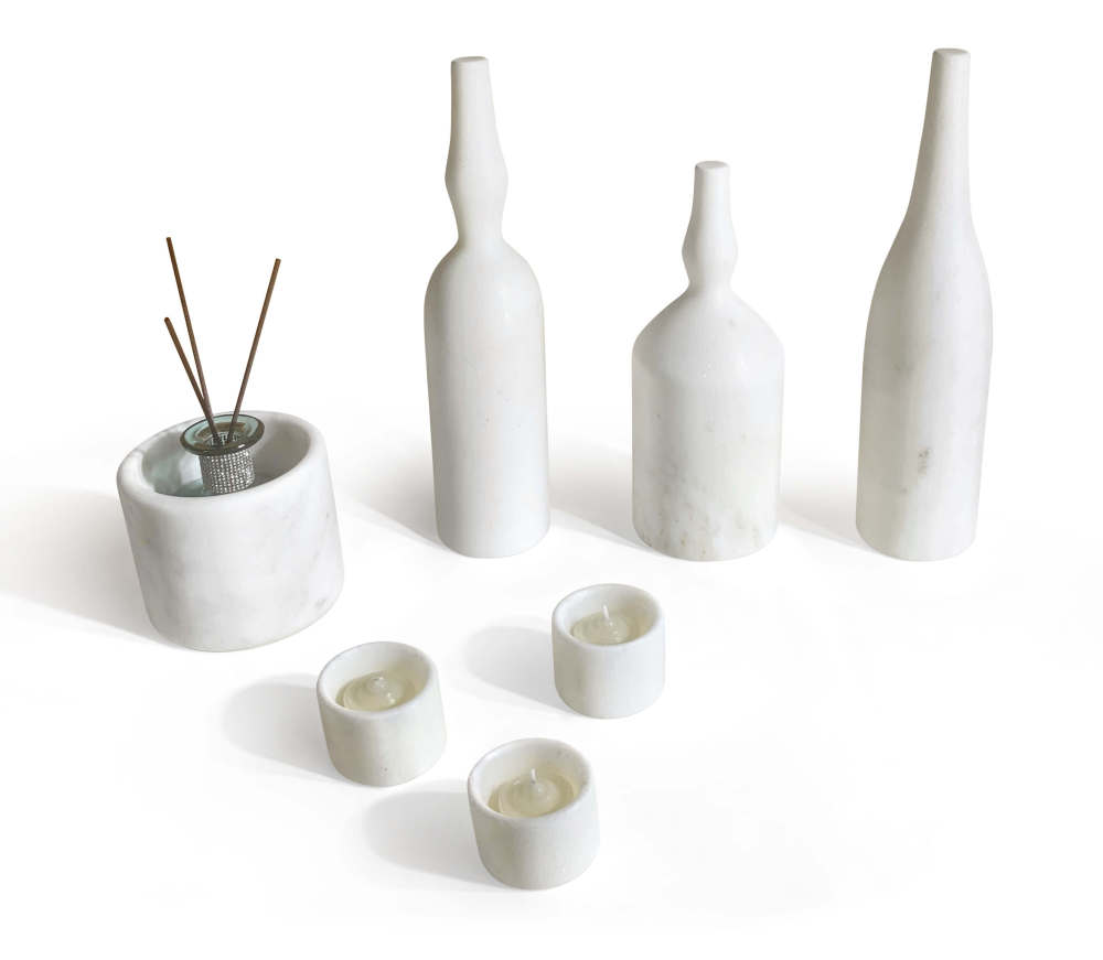 Natural marble sculptural ornament vases and candle holders. Note: Vases are for decorative purposes only and not suitable for arranging flowers or water.