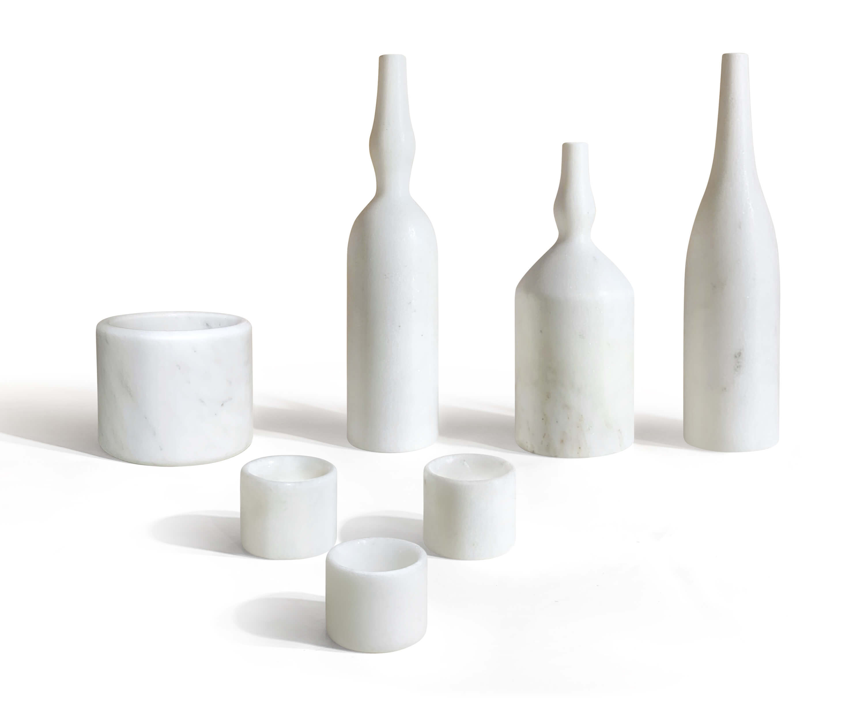 Luxury 7-piece Snow Mountain White natural marble home decor set. 100% natural exclusive stone with unique veining, including diffuser holder and sculptural vases.