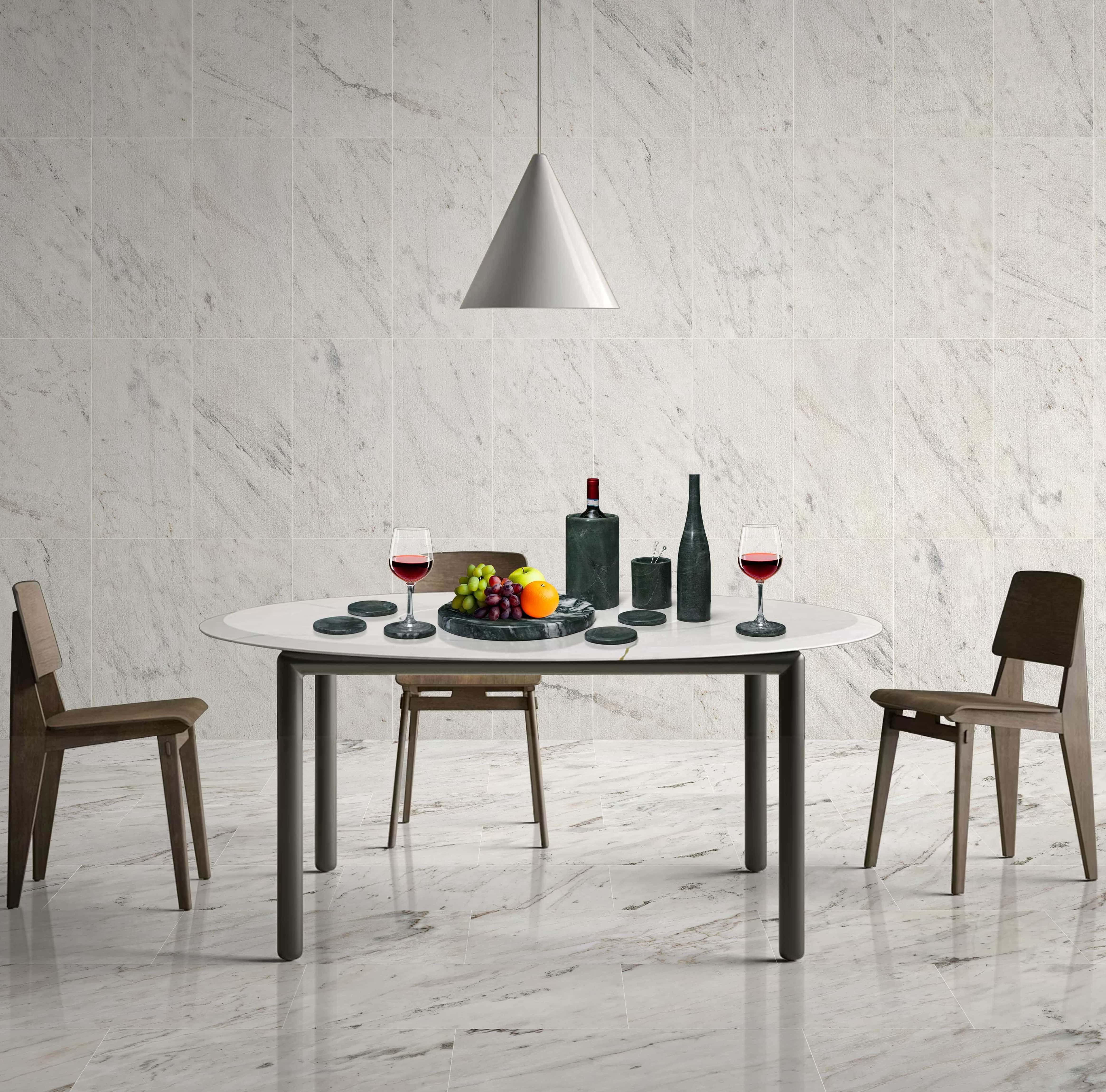 Modern dining room featuring Snow Mountain White textured wall tiles and polished floor tiles with Diamond Green marble decor.