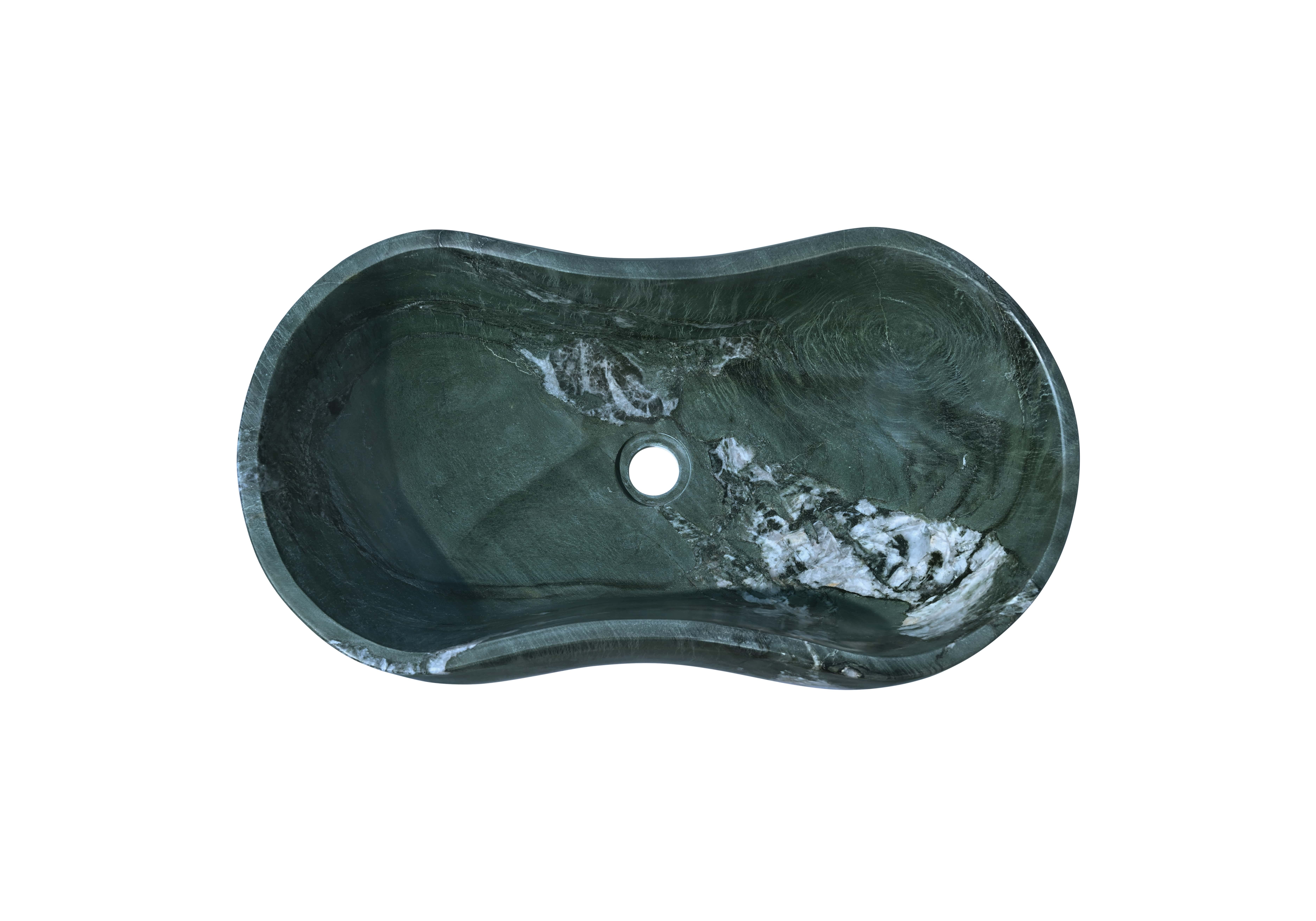 Top-down view of a Diamond Green marble sink with dramatic white crystalline veining, highlighting the unique natural stone pattern and center drain.