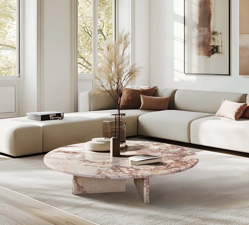 Sculptural 35-inch pink marble table defining the horizontal lines of a minimalist contemporary living space with neutral tones and soft natural light.