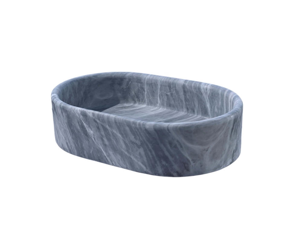 Side elevation of oval Carrara gray natural marble vessel sink, displaying vertical veining flow across the 25mm exterior wall and honed surface.