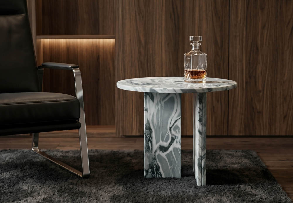 Cloudy blue marble side table styled in mid-century lounge with walnut paneling, black leather armchair, and crystal whisky decanter.