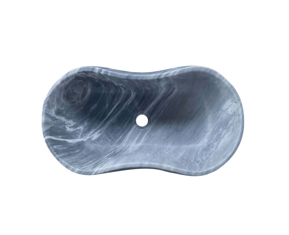 Overhead view of Carrara gray marble vessel sink showing concentric swirl pattern and dense white veining on hand-honed natural stone surface.