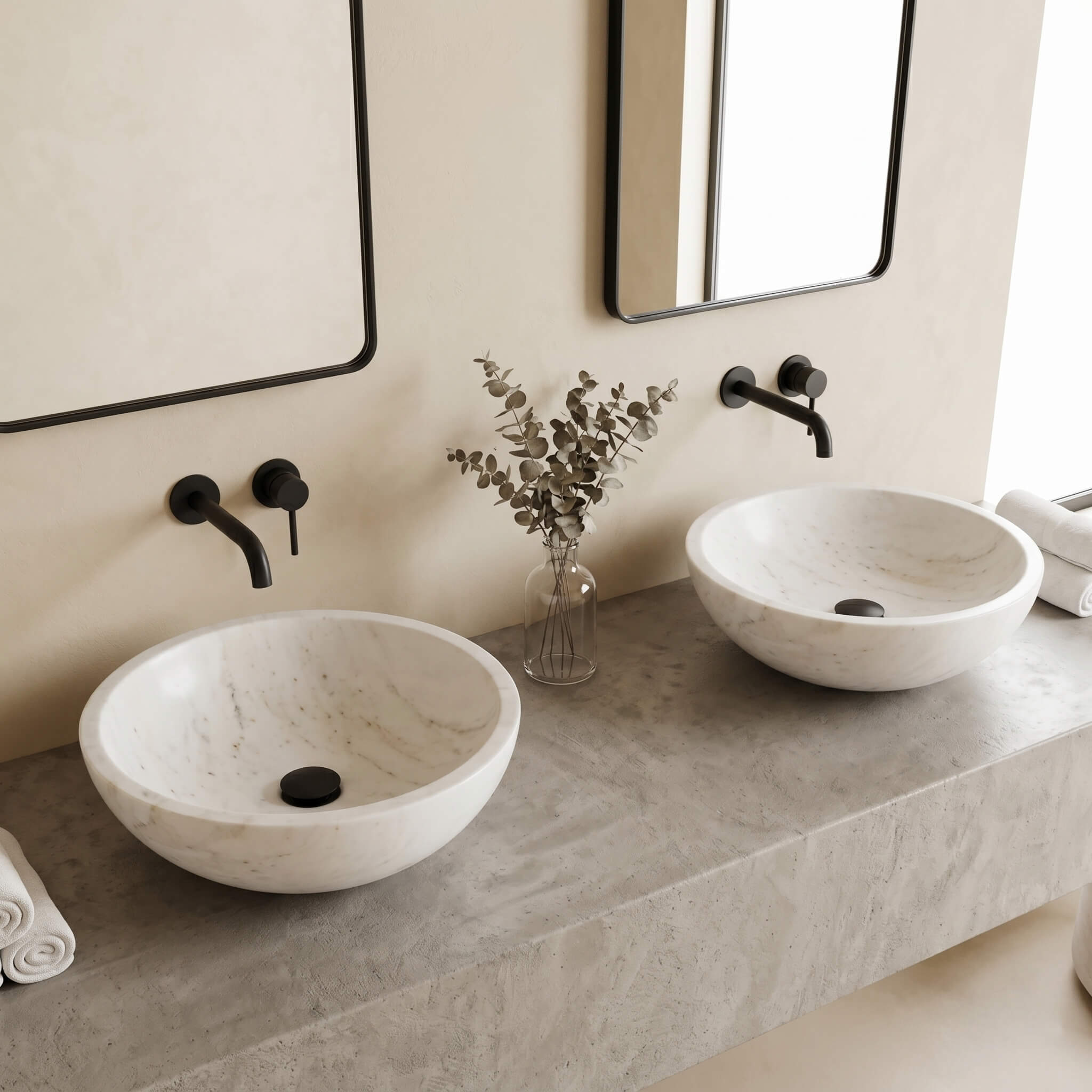 Snow Mountain white marble vessel sinks on concrete vanity, matte black wall faucets, Japandi microcement bathroom.